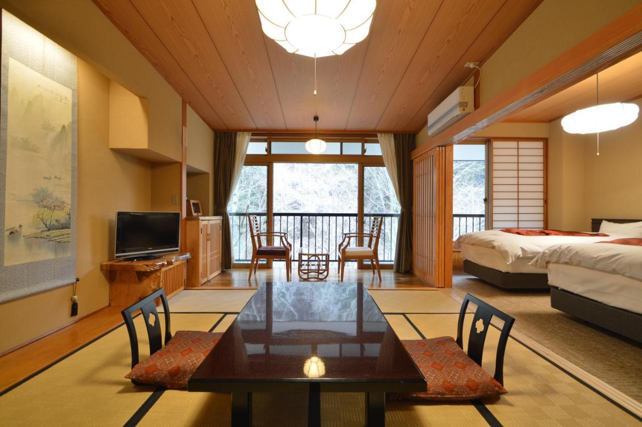 Отель Kurokawa Onsen Oku No Yu Минамиогуни Экстерьер фото